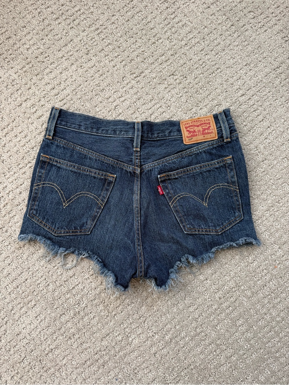 Levi's Denim Cutoff Jean Shorts in Dark Blue with Frayed Hem